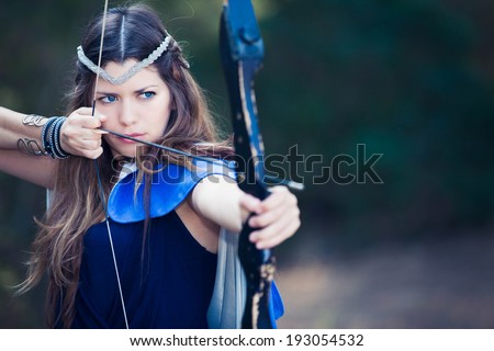fictional forest hunter girl with bow and arrow