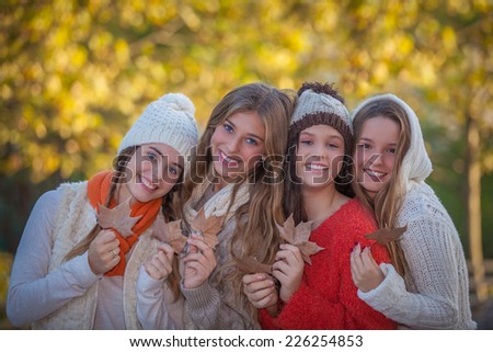 happy friends and smiles in autumn