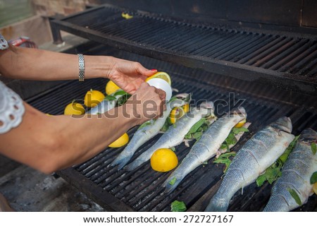 preparing fish meal outdoors