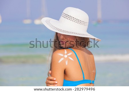 summer woman sun tan skin care concept