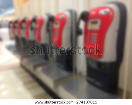 blur image of pay phone