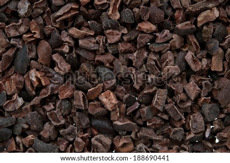 Cacao nibs isolated on white background