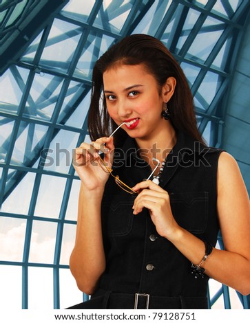 intelligent And Stylish Office Worker Standing In Her Office Building Foyer