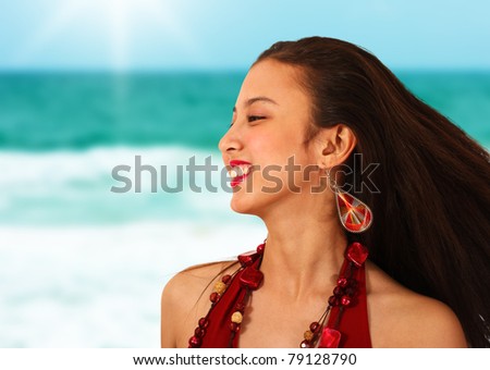 Relaxed Happy Girl On Vacation By The Sea In the Sunlight