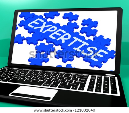 Expertise Puzzle On Notebook Showing Great Computer Skills And Abilities