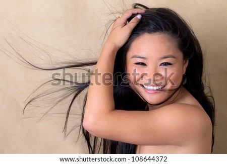 Cute Young Woman With Blowing Hair