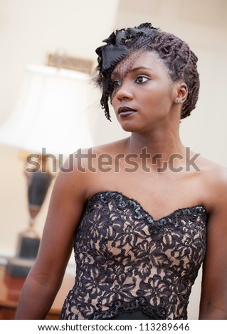 Beautiful Black Woman in Veil and Dress