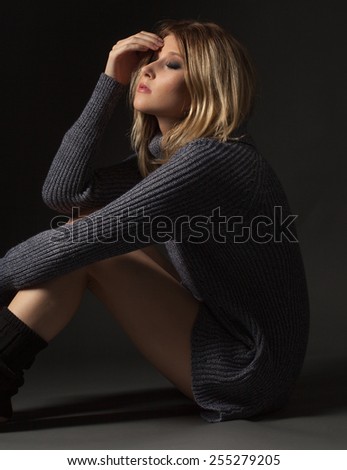 Pretty Woman in Sweater Dress and Leg Warmers