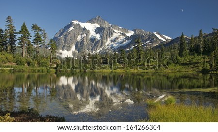 Mt. Shuksan reflected in Picture Lake.  Mt. Baker/Snoqualmie National Forest, WA.