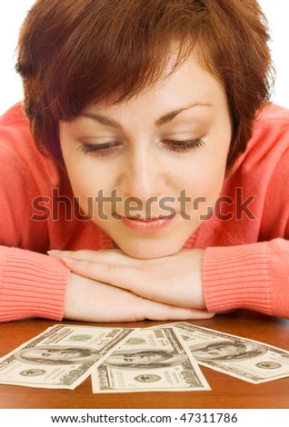 Doubting young woman with money