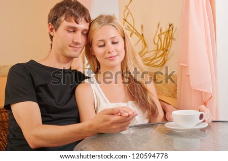 Young couple in the cafe