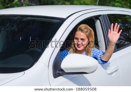 Young woman drive the car