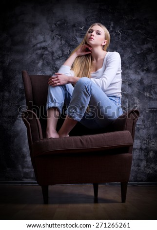 Young woman sit on chair