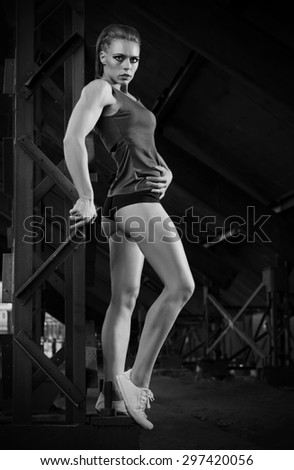 Young sporty woman in orange skirt (monochrome version)