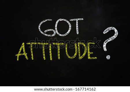 got attitude ? quote written with chalk on blackboard