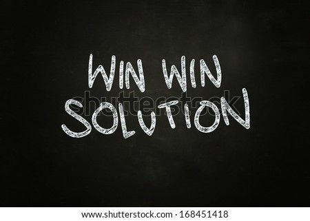 Win Win Solution Lettering, written with Color Chalk on Blackboard