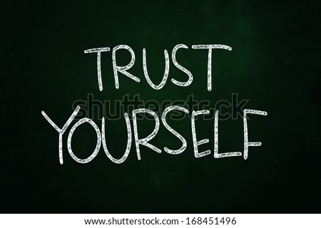 Trust Yourself Lettering, Motivational Phrase written with Chalk on Blackboard