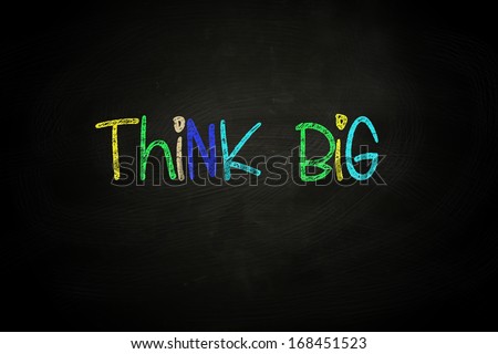 Think Big Lettering, written with Color Chalk on Blackboard