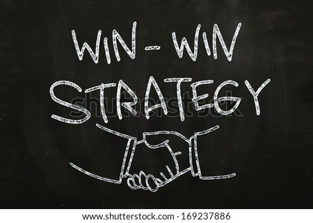 Win Win Strategy quotes and hand shakes, drawn with Chalk on Blackboard