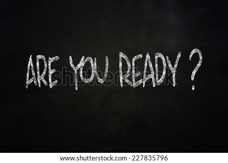 The words Are You Ready written with chalk on blackboard