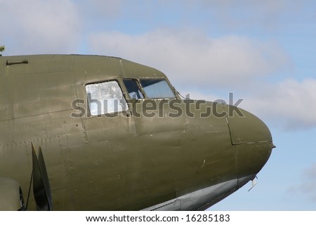 close up of nose section of dakota c47 aginst blue sky. room for text.
