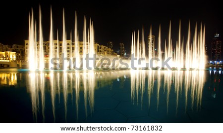 DUBAI, UAE - FEB 19: A record-setting fountain system set on Burj Khalifa Lake. Illuminated by 6600 lights and 25 projectors, it shoots water 150 m into the air. Taken on February 19, 2011 in Dubai.