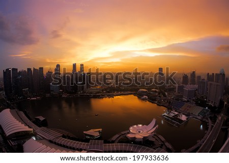 SINGAPORE - MAY 21: The Singapore skyline shines. Singapore has a highly developed market-based economy and is a center for commerce in Asia and globally May 21, 2014 in Singapore
