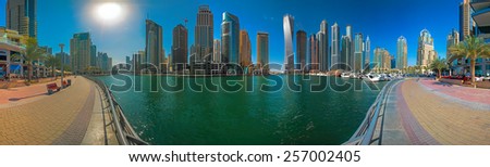 DUBAI, UAE - FEBRUARY 19: Modern buildings in Dubai Marina, on February 19, 2015, Dubai, UAE. Dubai Marina is an artificial canal city, built along a 3 km stretch of Persian Gulf shoreline