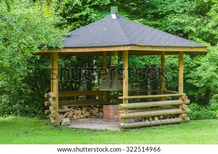 Small wooden grill house in the forest