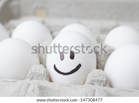 Egg with a smile drawn on it