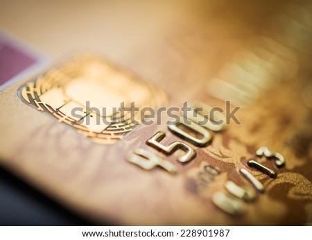 Golden credit card\'s micro chip up close