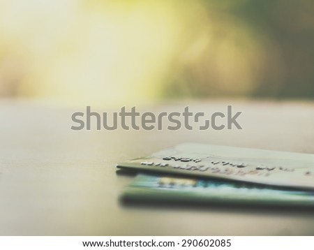 Credit cards up close with colorful bokeh - Split toned