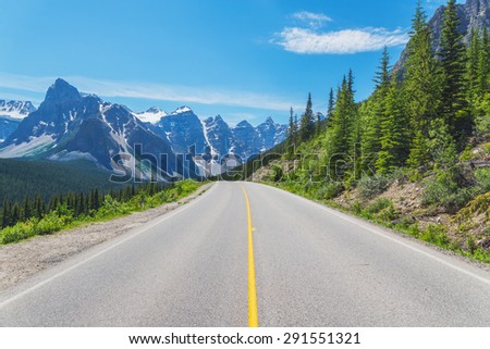 Quiet mountain road near Moraine Lake in Alberta, Canada