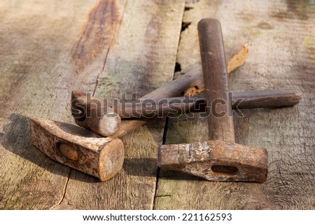 old vintage building tools on a wooden background