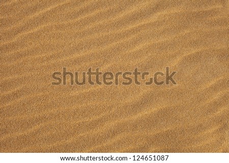 Texture of sand waves background Find Similar Files Download a Comp Save to Lightbox   Golden sand waves in a beach