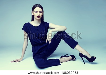 high fashion portrait of young elegant woman. Studio shot