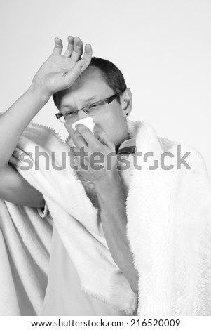 Sick man.Flu.Woman Caught Cold. Sneezing into Tissue. Headache. Virus .Medicines