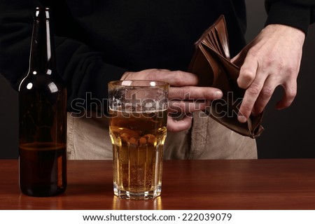 Empty wallet and alcohol, no money