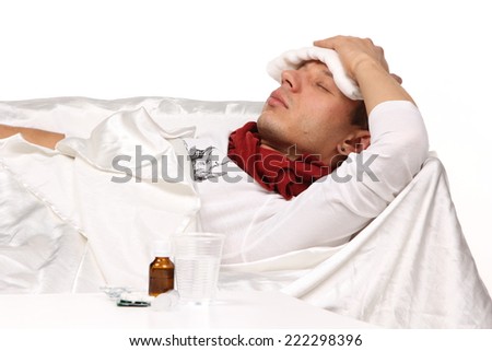 Sick man. Flu. Caught Cold. Sneezing into Tissue. Headache. Virus .Medicines