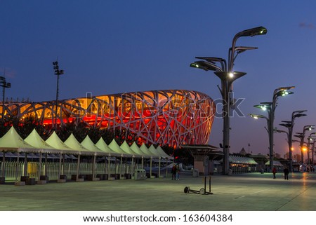 BEIJING, CHINA - OCT 10: The Beijing National Stadium, also known as the Bird\'s Nest on Oct 10, 2013 in Beijing. This Olympic venue is regarded as one of the Beijing\'s Top 10 tourist attractions.