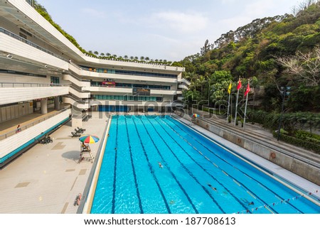 HONG KONG, CHINA - APR 15, 2014: Swimming Pool of City University of Hong Kong is located in Tat Chee Avenue, Kowloon Tong. CityU was originally founded as City Polytechnic of Hong Kong.