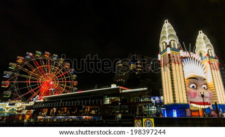 SYDNEY, NSW, AUSTRALIA - MAY 29, 2014: Sydney Luna Park at night. The clown face at the entrance of Luna Park, one of the iconic entertainment precincts in Sydney. Sydney, Australia