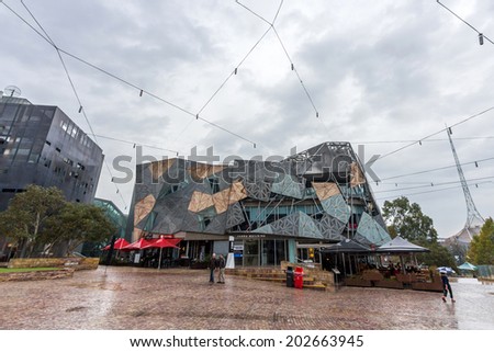 MELBOURNE, AUSTRALIA - JUNE 3, 2014: Federation Square, in Melbourne, is a mixed-use development covering an area of 3.2 hectares built on top of a concrete deck above busy railway lines.