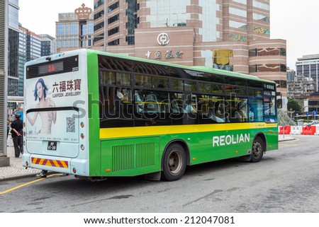 MACAU - JUNE 6, 2014: TRANSMAC and TCM are the two bus companies operating all public and mini buses in Macau, China. Bus lines cover almost all the attractions.
