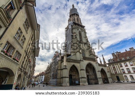 BERN, SWITZERLAND - NOV 05, 2014: The Bern Minster is a Swiss Reformed cathedral, in Bern. Its construction started in 1421. Its tower, with a height of 100.6 m, was only completed in 1893.