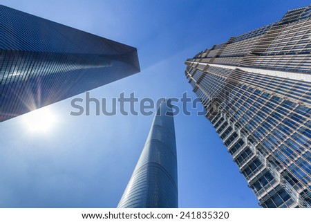 SHANGHAI, CHINA - OCT 24, 2014: Shanghai Tower, World Financial Center and Jin Mao Tower in Shanghai, China. These are the tallest and 3rd tallest buildings in Shanghai.
