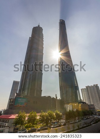 SHANGHAI, CHINA - OCT 24, 2014: Shanghai Tower and Jin Mao Tower in morning sun light in Shanghai, China. These are the tallest and 3rd tallest buildings in Shanghai.