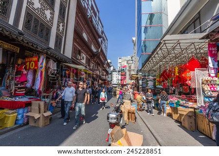 SHANGHAI, CHINA - OCT 24, 2014: Chinese shopping streets around Yuyuan Market in Shanghai, China. It\'s located next to famous Yuyuan Garden. There are over ten shopping streets in this market.