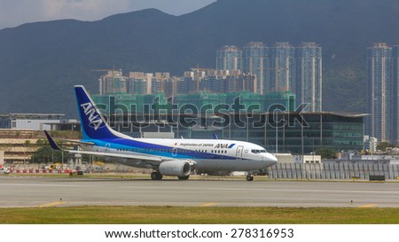 HONG KONG - APR 30, 2015: All Nippon Airways flight in Hong Kong International Airport. About 90 airlines operate flights from HKIA to over 150 cities across the globe.