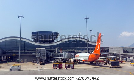 HONG KONG - APR 30, 2015: Jeju Air flight in Hong Kong International Airport. About 90 airlines operate flights from HKIA to over 150 cities across the globe.